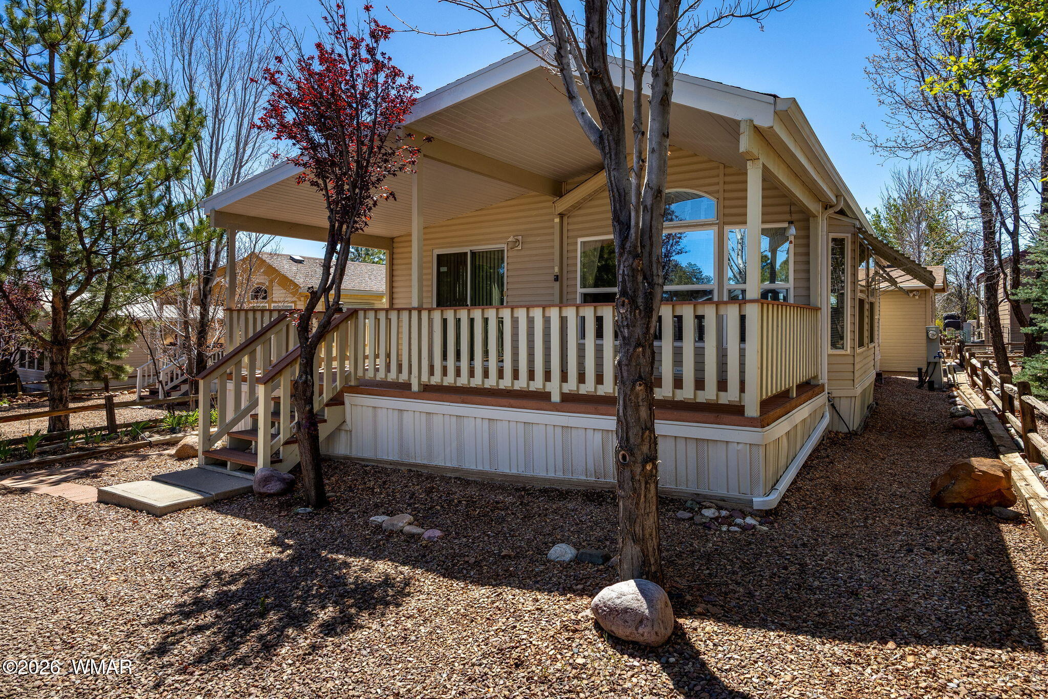 2221 Wrangler Way Overgaard, AZ 85933 - Photo 4 of 24 a view of a house with a yard