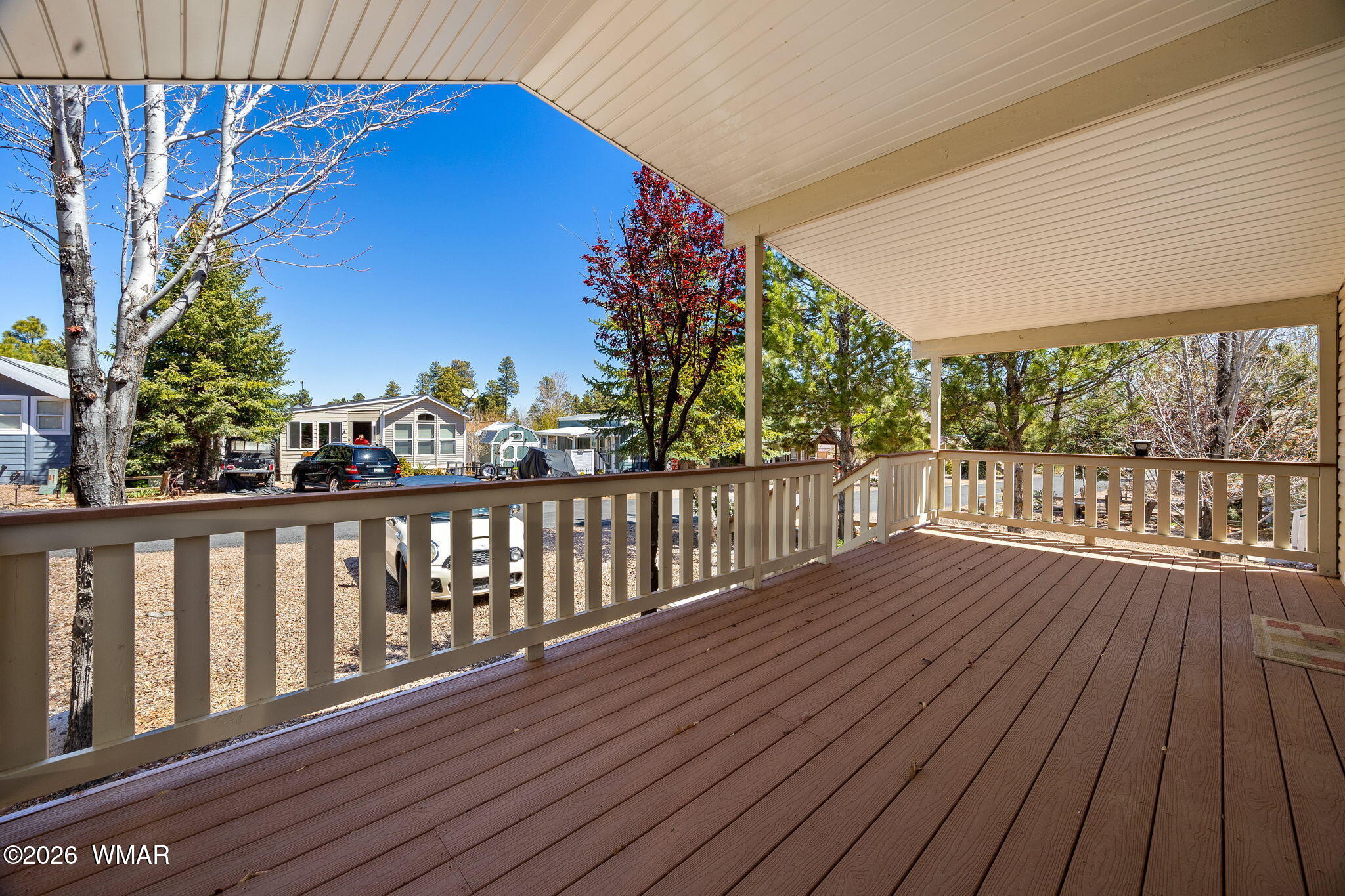 2221 Wrangler Way Overgaard, AZ 85933 - Photo 6 of 24 a view of balcony with wooden floor