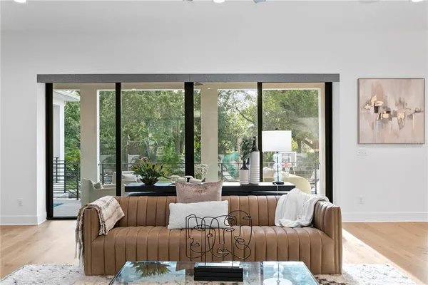 a kitchen with a refrigerator and cabinets