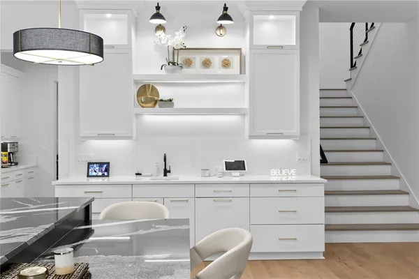 a bedroom with a bed and a walk in closet