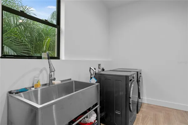 a white bath tub sitting in a bathroom