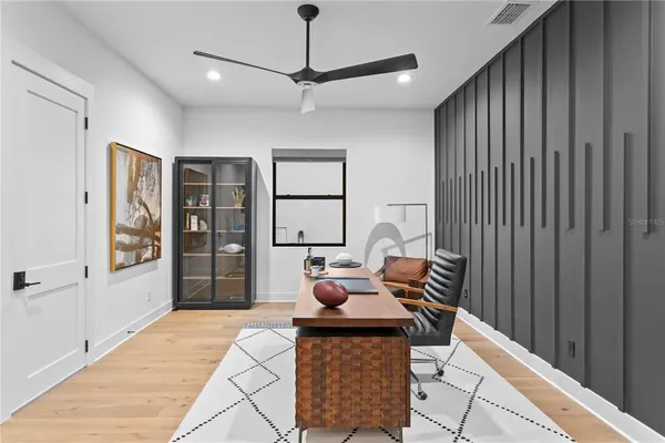 a living room with furniture a rug and a rug