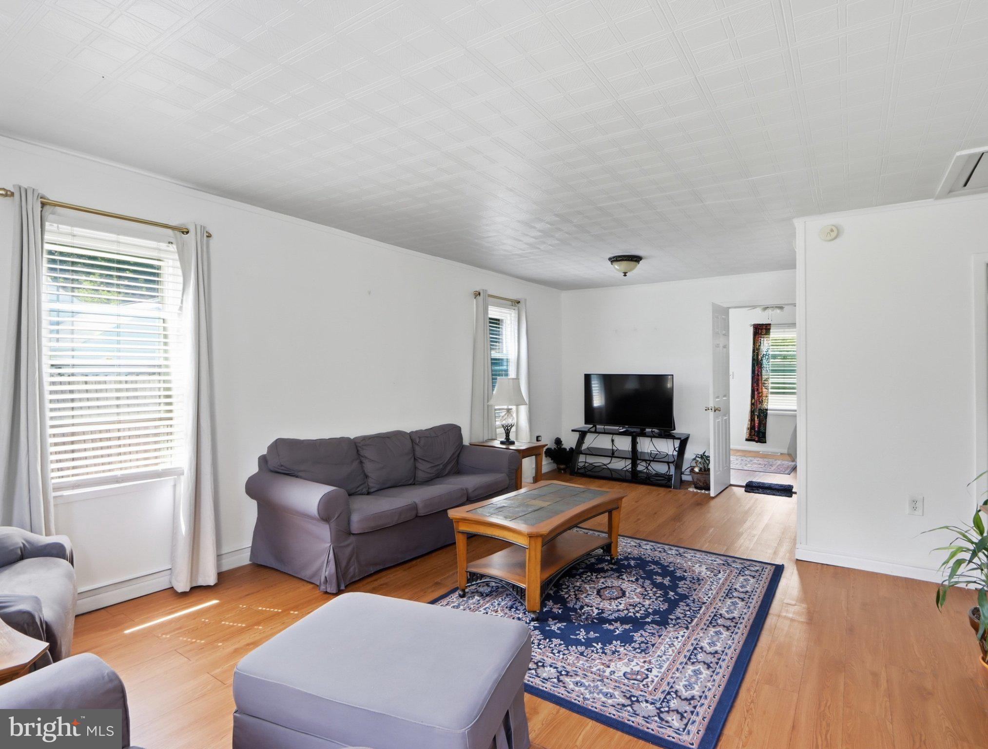 8176 Lea Road Pasadena, MD 21122 - Photo 6 of 23 Bright and inviting living space.