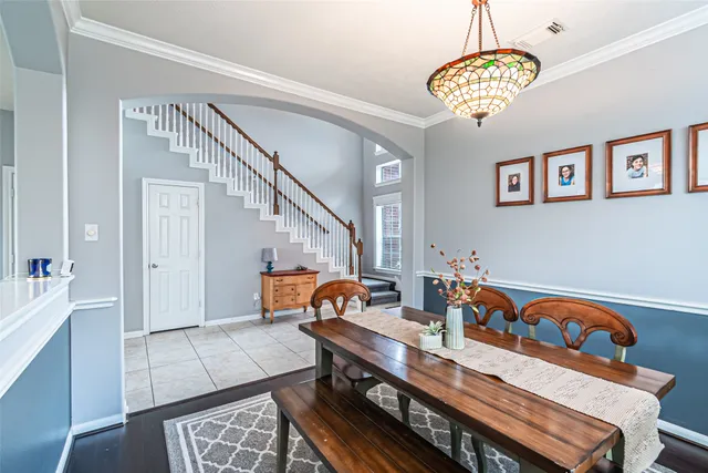 a view of a dining room with furniture