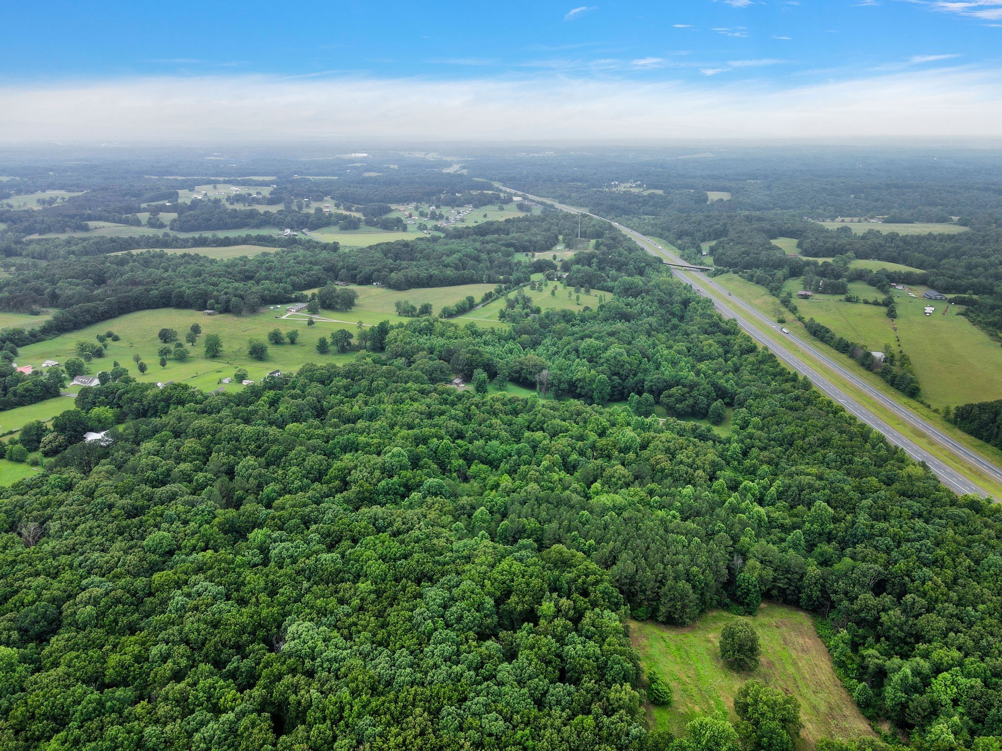 921 Eli Road Bon Aqua, TN 37025 - Photo 13 of 13 an aerial view of city and green space