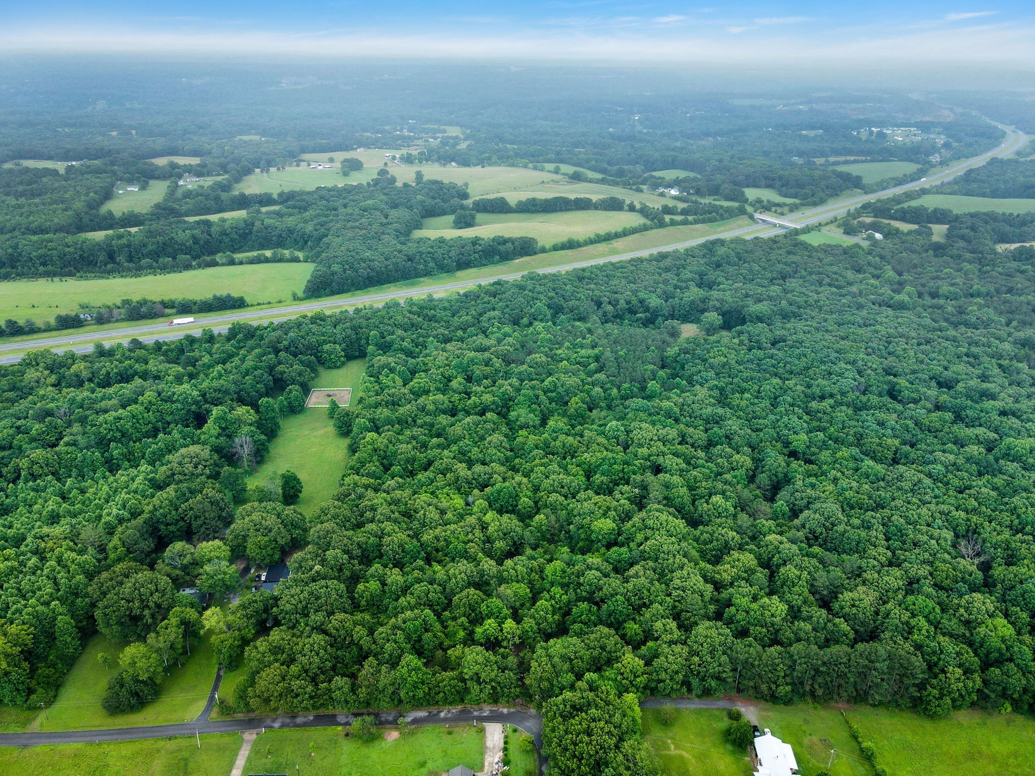 921 Eli Road Bon Aqua, TN 37025 - Photo 4 of 13 a view of a green field with lots of green space
