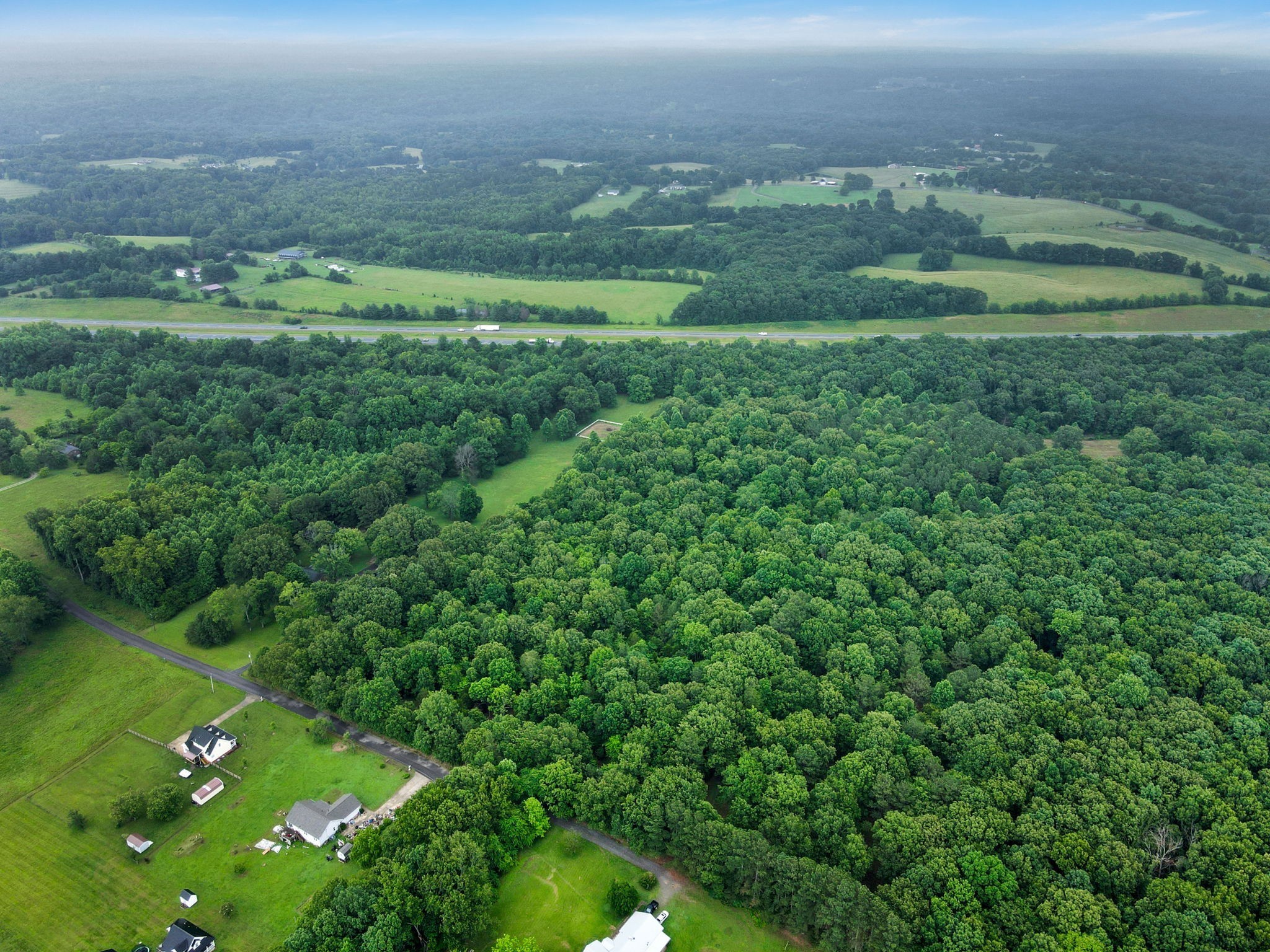 921 Eli Road Bon Aqua, TN 37025 - Photo 5 of 13 a view of a green field with lots of green space