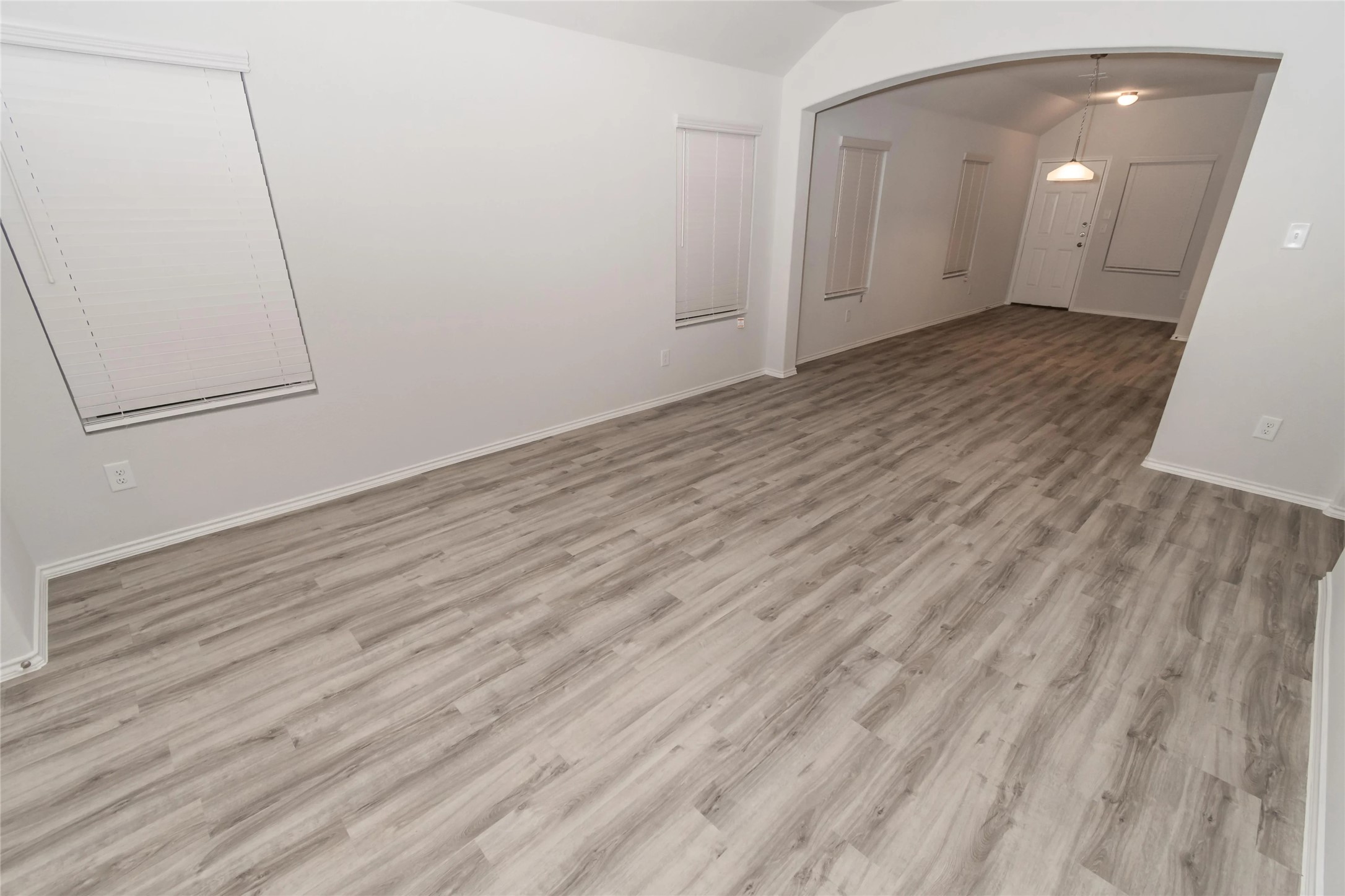 8711 Lar Ree Oaks Circle Houston, TX 77028 - Photo 4 of 8 a view of a room with wooden floor