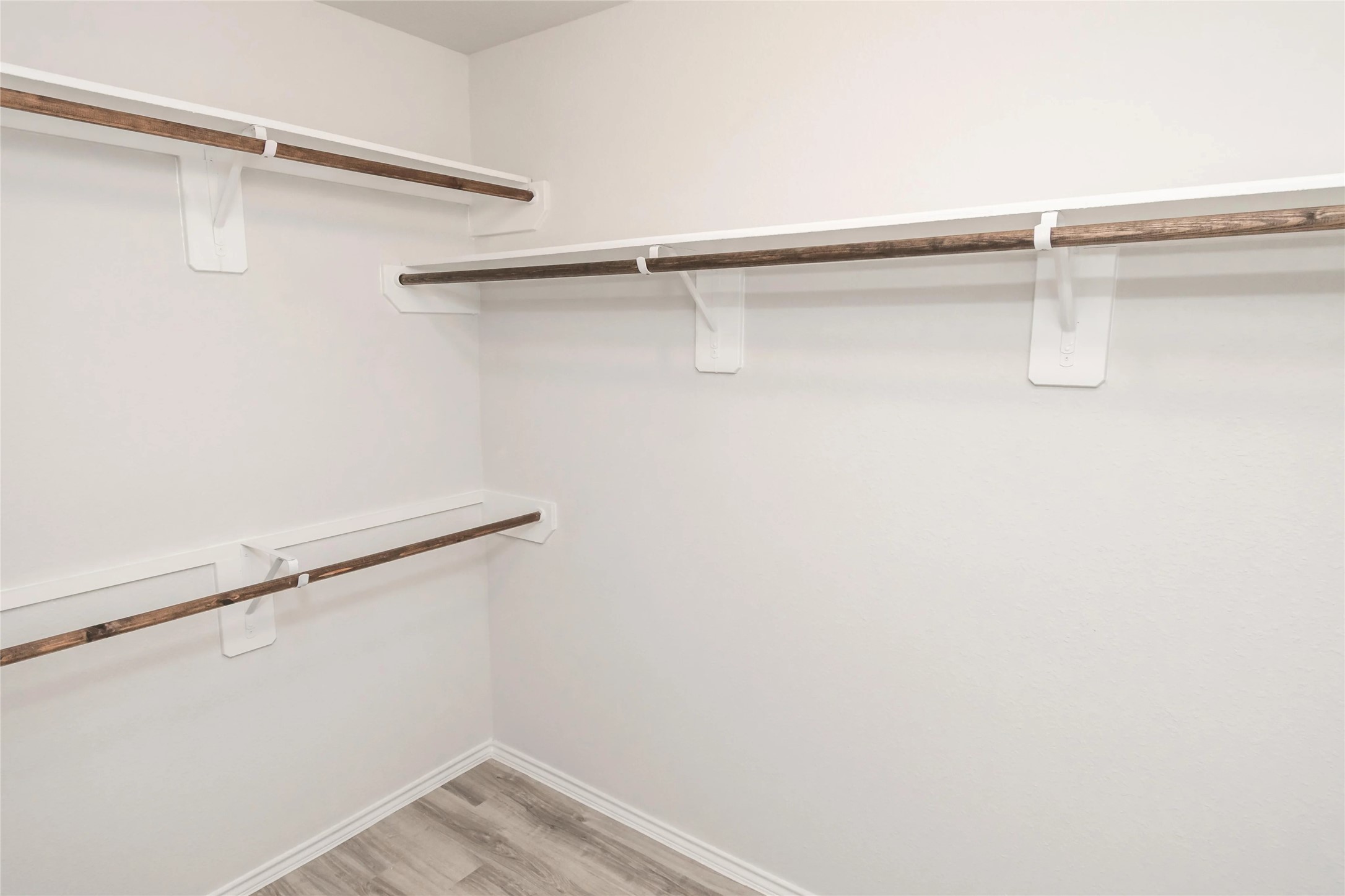 8711 Lar Ree Oaks Circle Houston, TX 77028 - Photo 7 of 8 a view of a room with racks on the wall