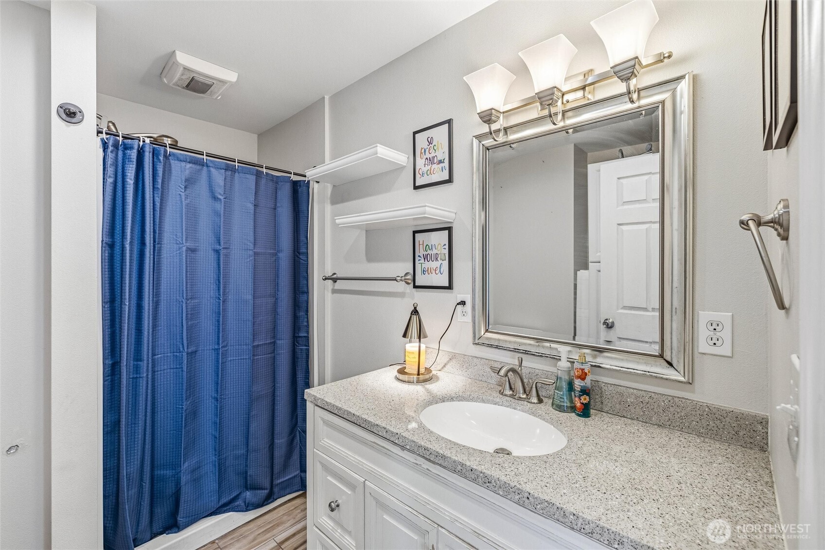 113 South Gardner Road Burlington, WA 98233 - Photo 14 of 40 a bathroom with a granite countertop sink and a mirror