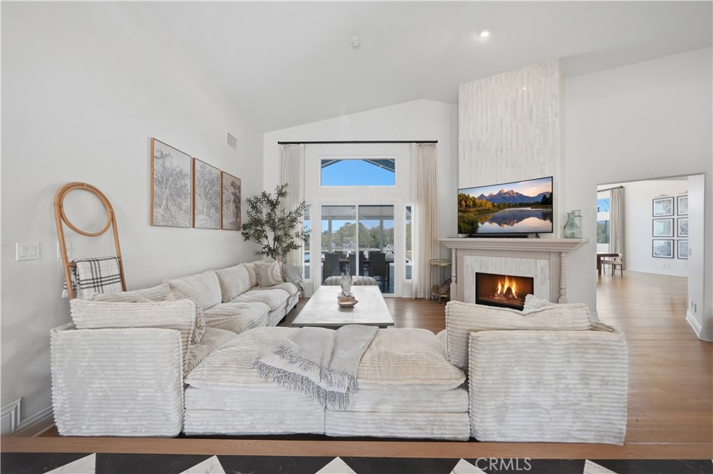 41110 Los Ranchos Circle Temecula, CA 92592 - Photo 20 of 77 a living room with furniture and a fireplace