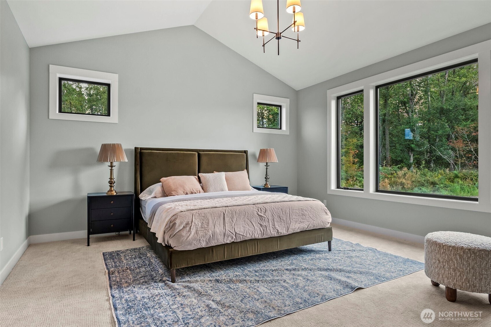 12107 Mundy Loss Road Buckley, WA 98321 - Photo 15 of 40 a bedroom with a large bed and a window