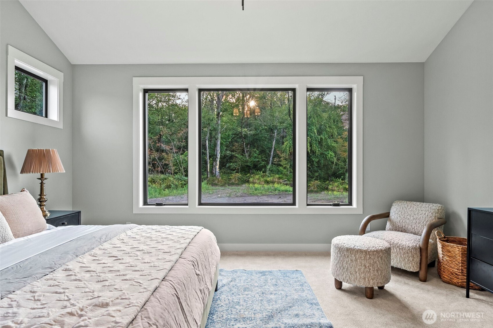 12107 Mundy Loss Road Buckley, WA 98321 - Photo 16 of 40 a bedroom with a bed and large window