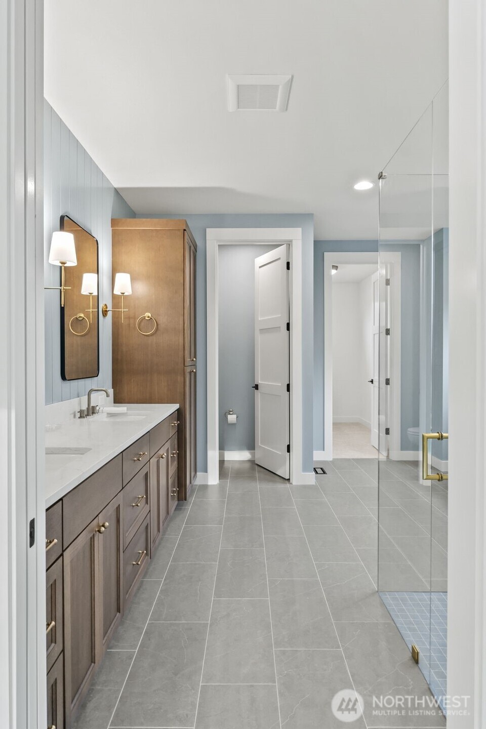 12107 Mundy Loss Road Buckley, WA 98321 - Photo 17 of 40 a bathroom with a double vanity sink mirror and shower