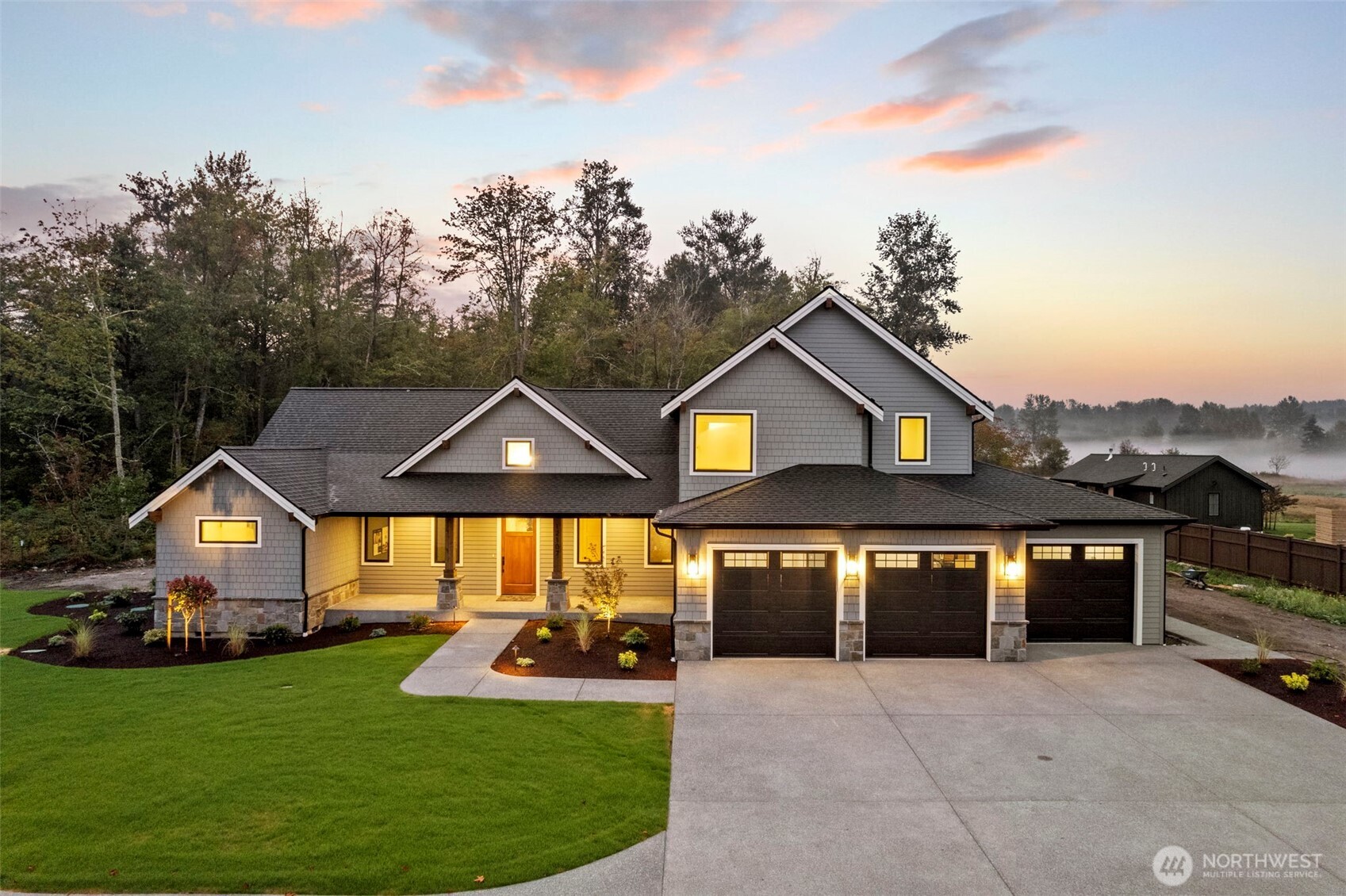 12107 Mundy Loss Road Buckley, WA 98321 - Photo 2 of 40 a front view of house with yard and green space