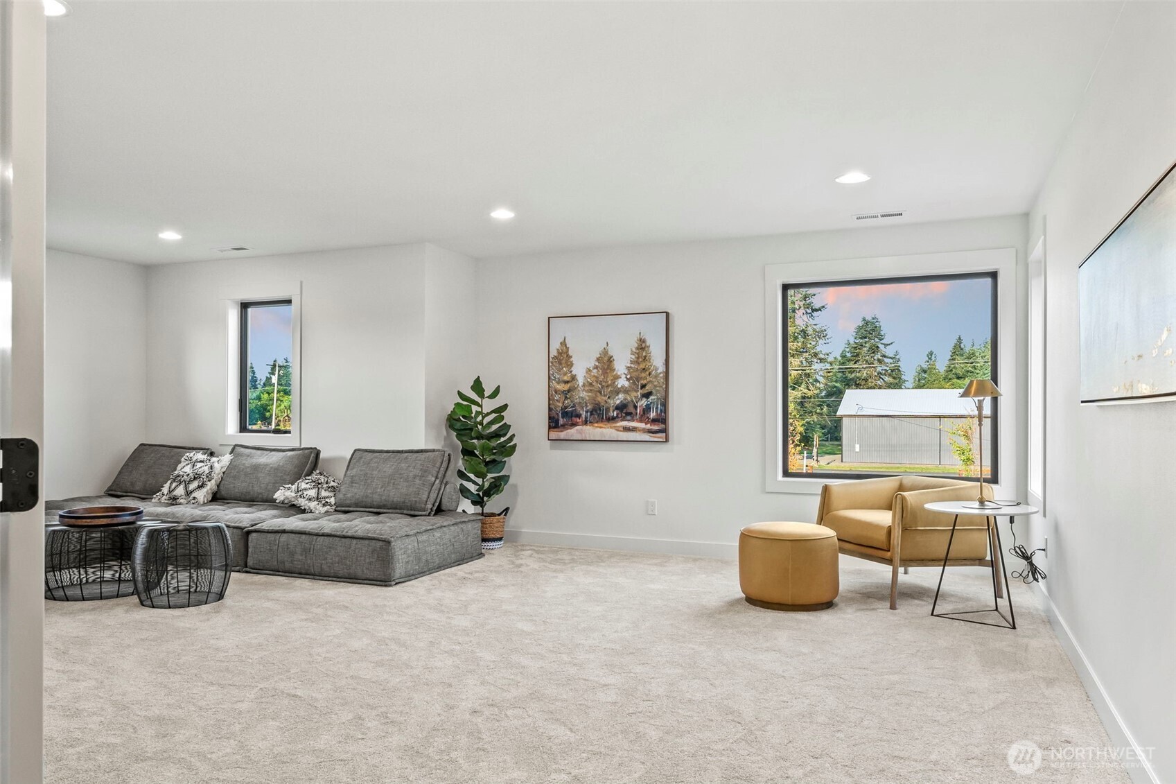 12107 Mundy Loss Road Buckley, WA 98321 - Photo 29 of 40 a living room with furniture and a large window