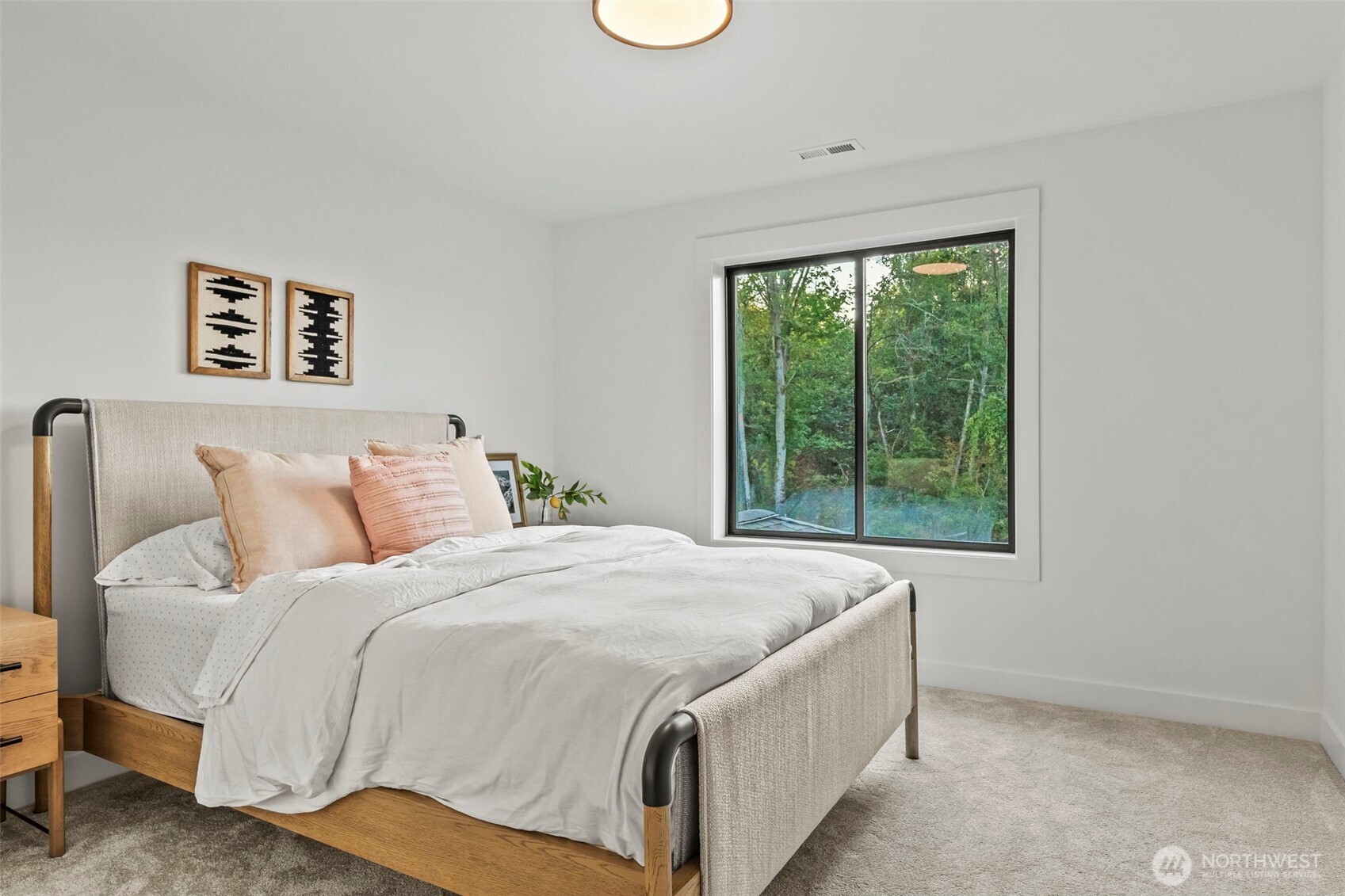 12107 Mundy Loss Road Buckley, WA 98321 - Photo 35 of 40 a bedroom with a bed and a window