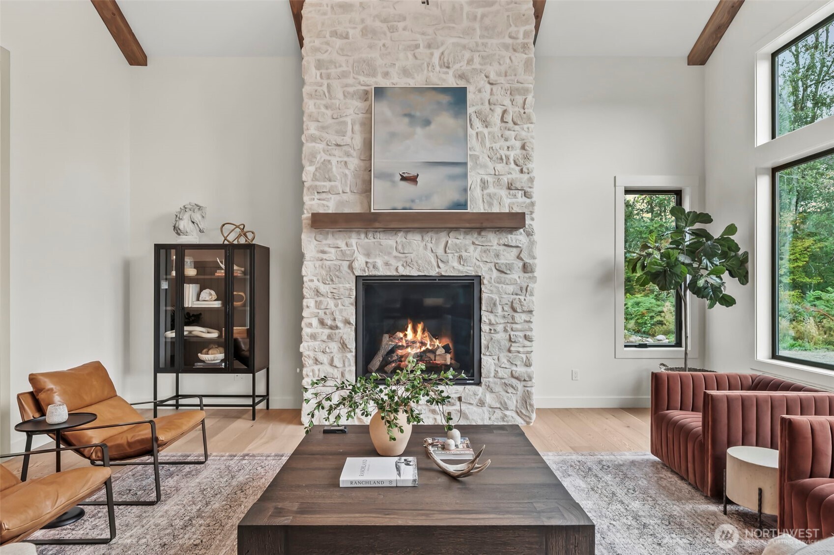 12107 Mundy Loss Road Buckley, WA 98321 - Photo 7 of 40 a living room with furniture and a fireplace