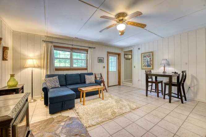3333 Ellington Road Hayesville, NC 28904 - Photo 50 of 56 a living room with furniture and a large window