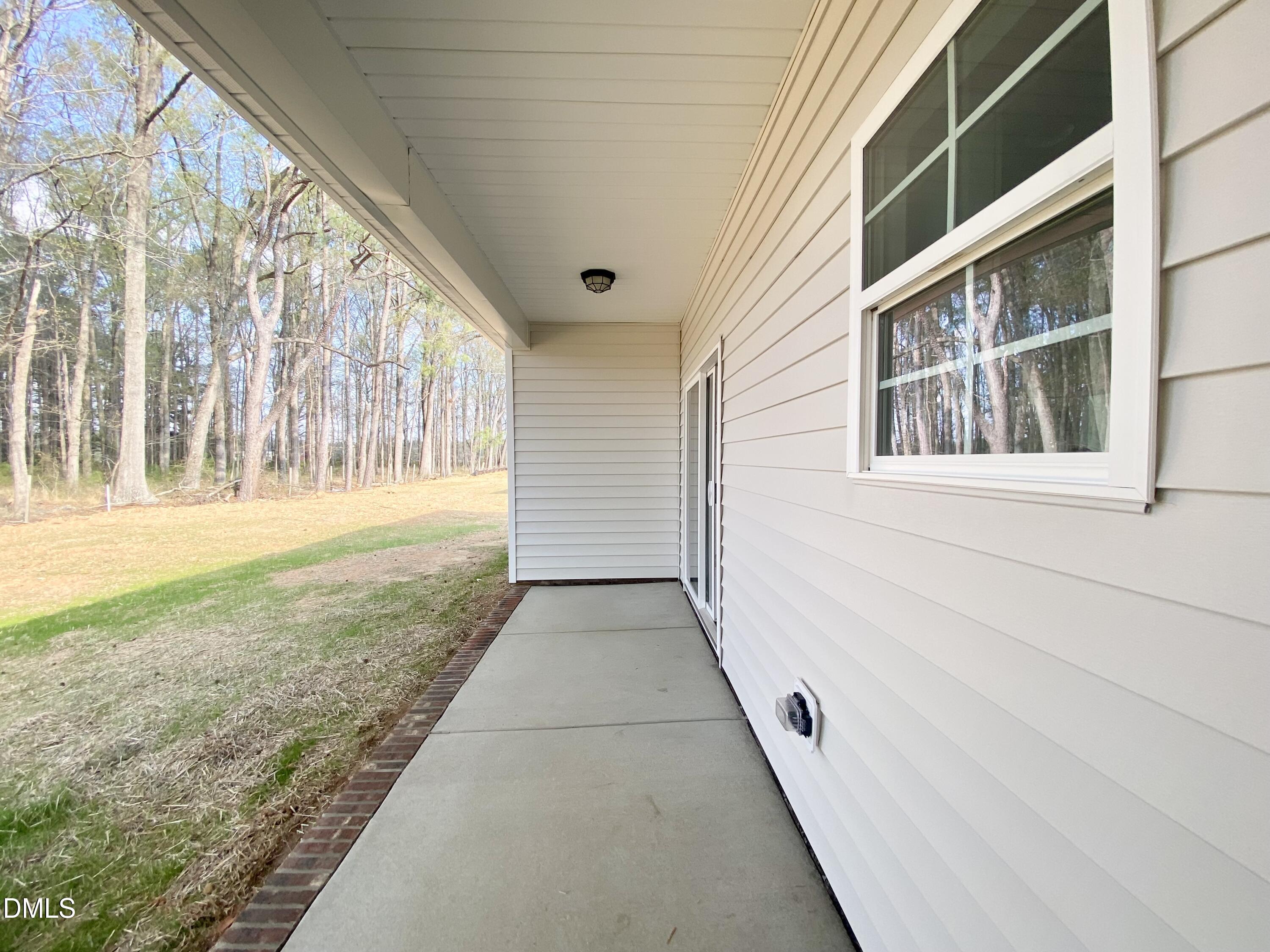 155 Nectar Lane Bunnlevel, NC 28323 - Photo 15 of 16 a view of a large building with an outdoor space