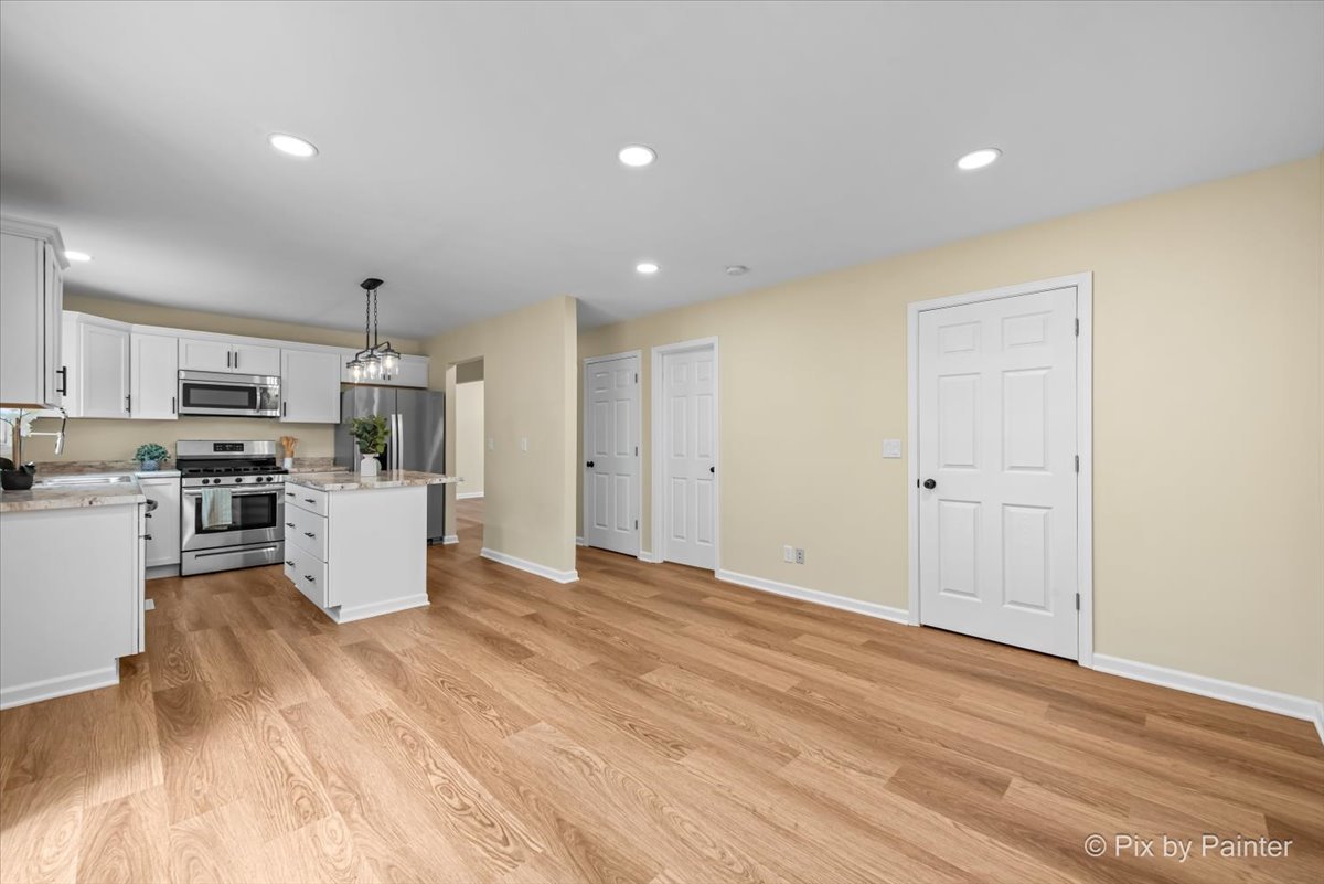 676 Concord Drive Crystal Lake, IL 60014 - Photo 11 of 38 a view of kitchen with wooden floor