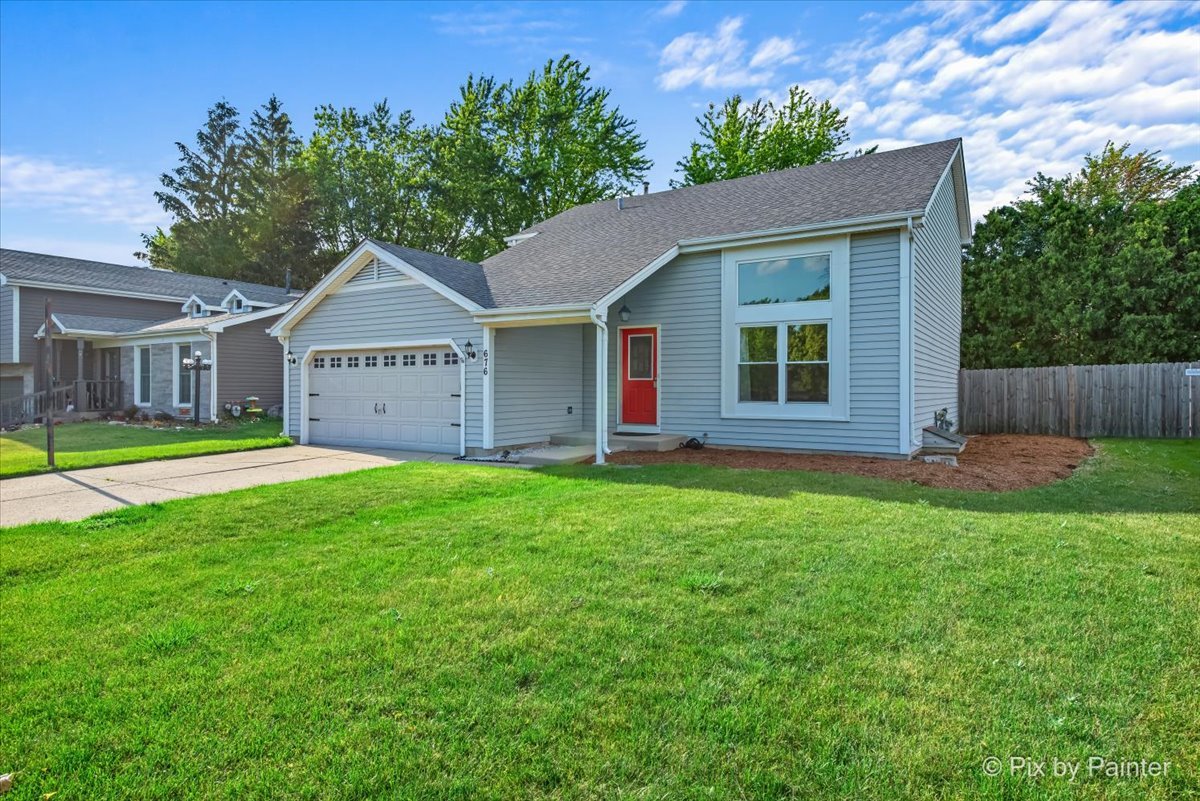 676 Concord Drive Crystal Lake, IL 60014 - Photo 2 of 38 a view of a house with a yard