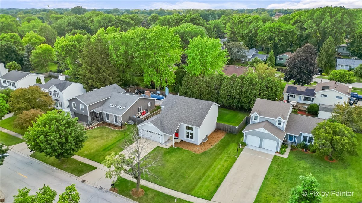 676 Concord Drive Crystal Lake, IL 60014 - Photo 35 of 38 an aerial view of a house with garden space and street view