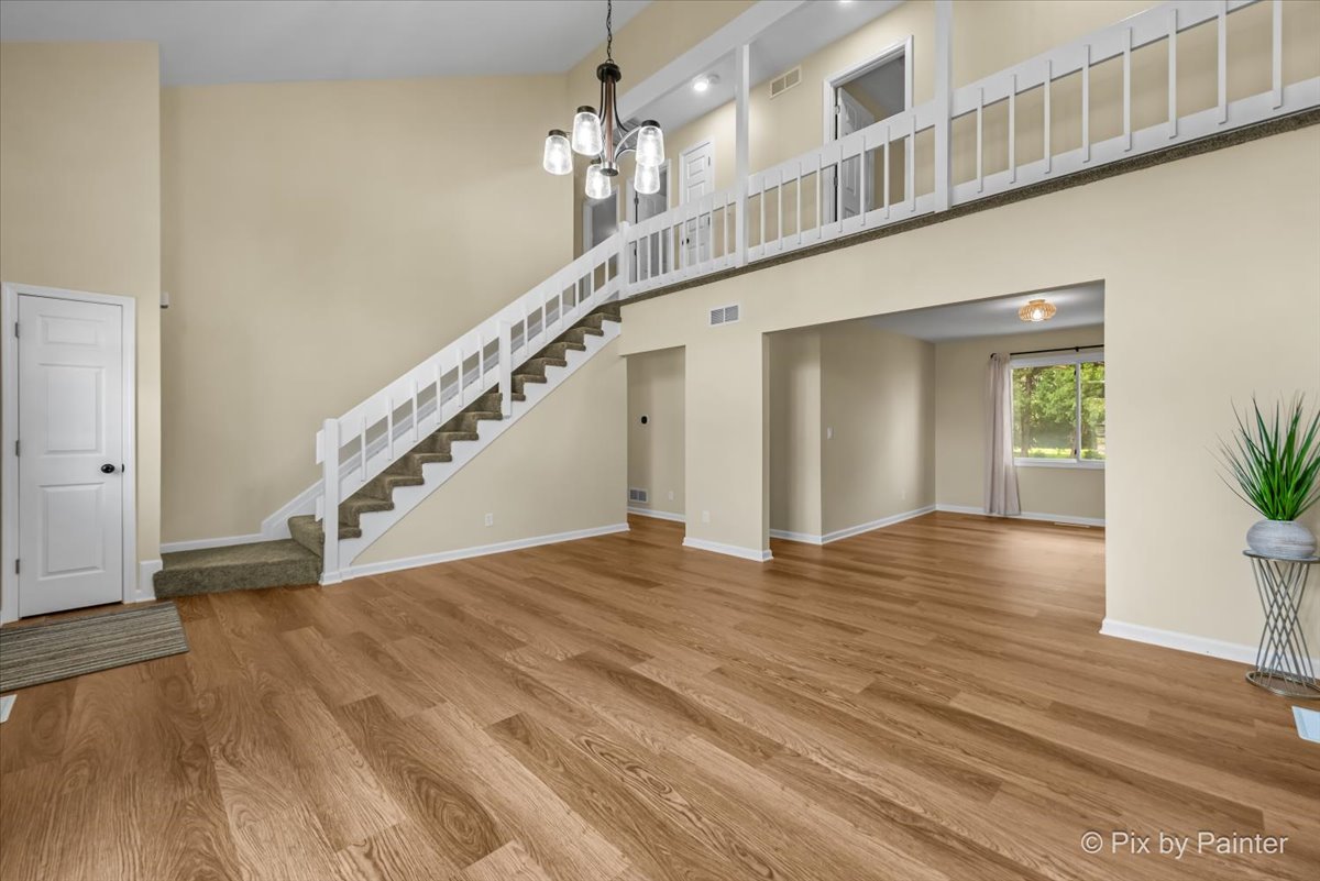 676 Concord Drive Crystal Lake, IL 60014 - Photo 4 of 38 a view of entryway and hall with wooden floor