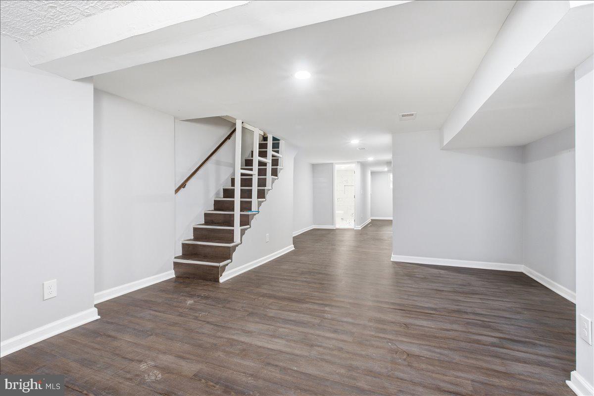 1231 North Potomac Street Baltimore, MD 21213 - Photo 20 of 25 a view of an entryway with wooden floor