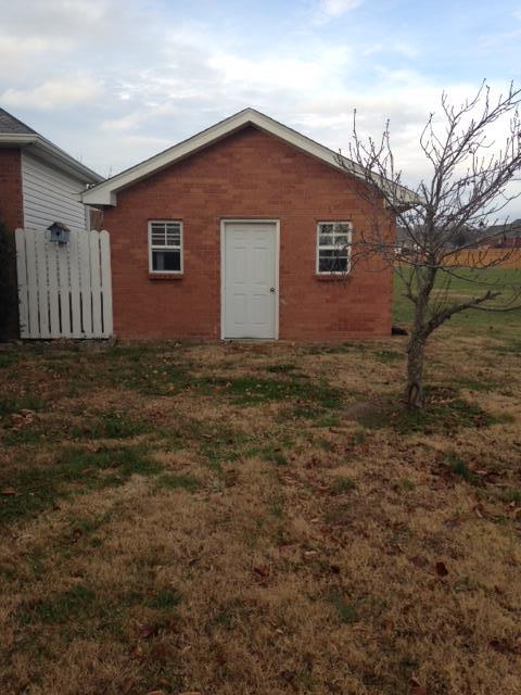 277 Bradshaw Road Lebanon, TN 37087 - Photo 5 of 30 a front view of a house with a yard