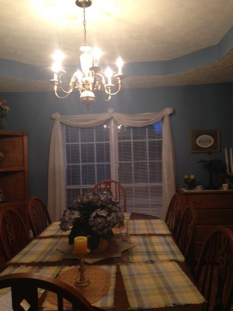277 Bradshaw Road Lebanon, TN 37087 - Photo 7 of 30 a view of a dining room with furniture and chandelier