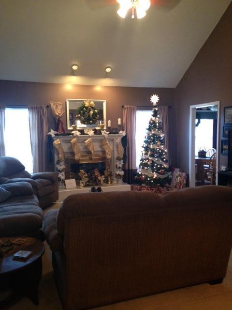 277 Bradshaw Road Lebanon, TN 37087 - Photo 8 of 30 a living room with furniture and a chandelier
