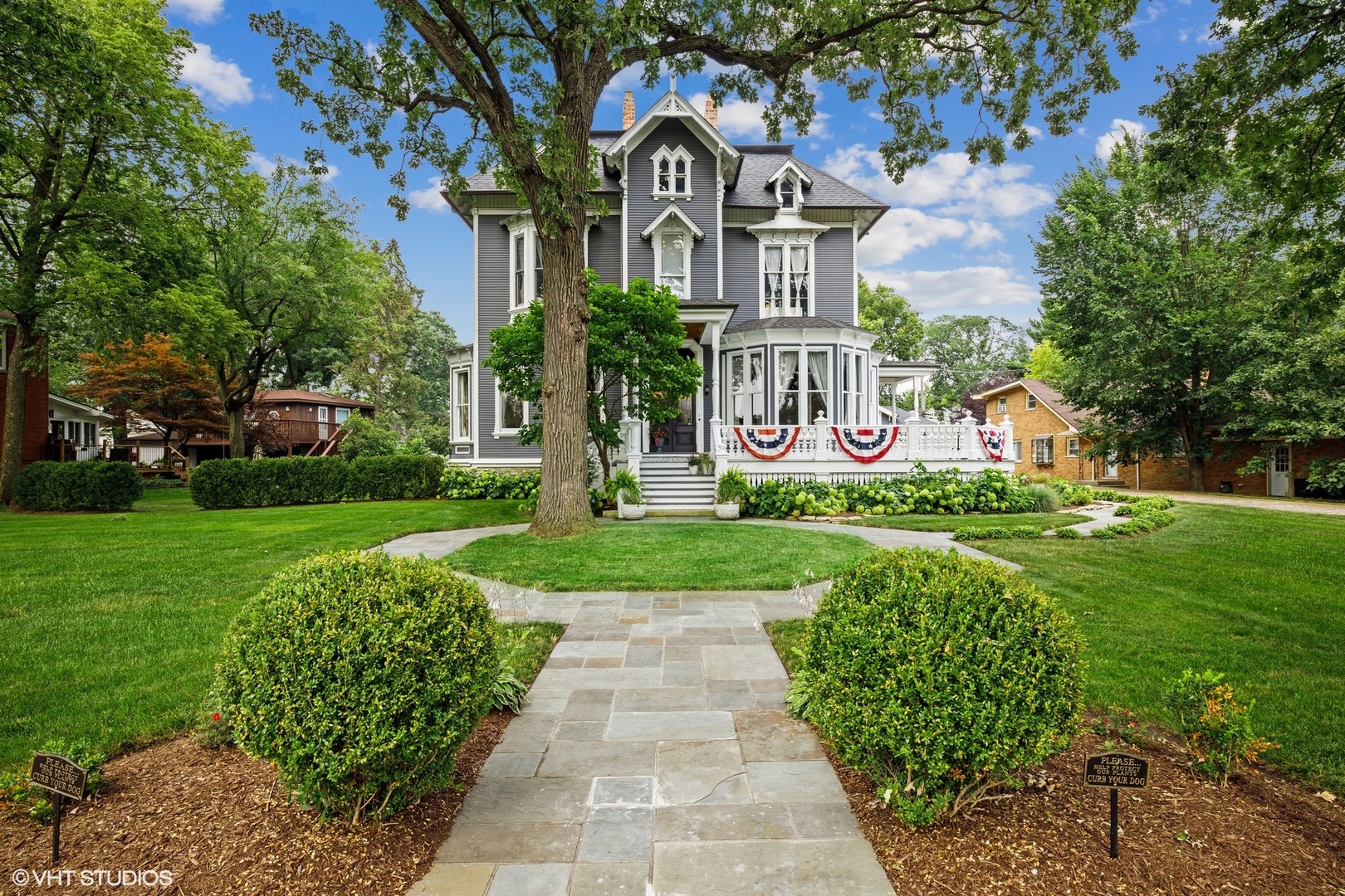 84 Riverside Road Riverside, IL 60546 - Photo 1 of 1 a front view of house with yard and green space