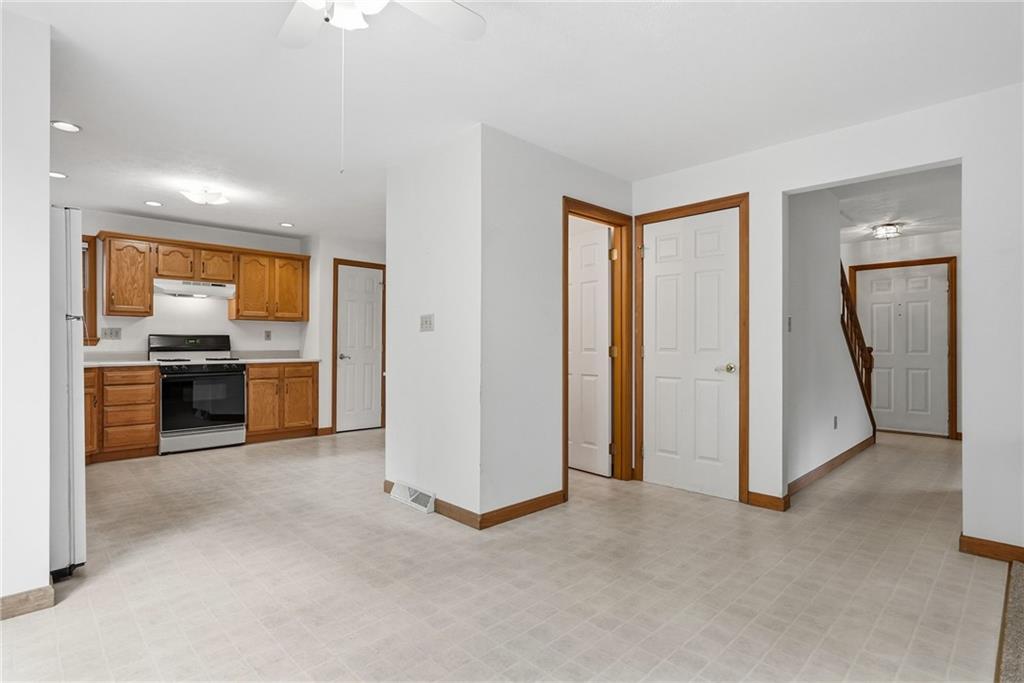 114 Sika Drive Pittsburgh, PA 15239 - Photo 13 of 45 a view of a kitchen with a sink a refrigerator and cabinets