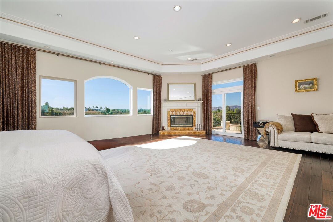 22470 Sueno Road Woodland Hills, CA 91364 - Photo 17 of 18 a view of a livingroom with furniture and staircase