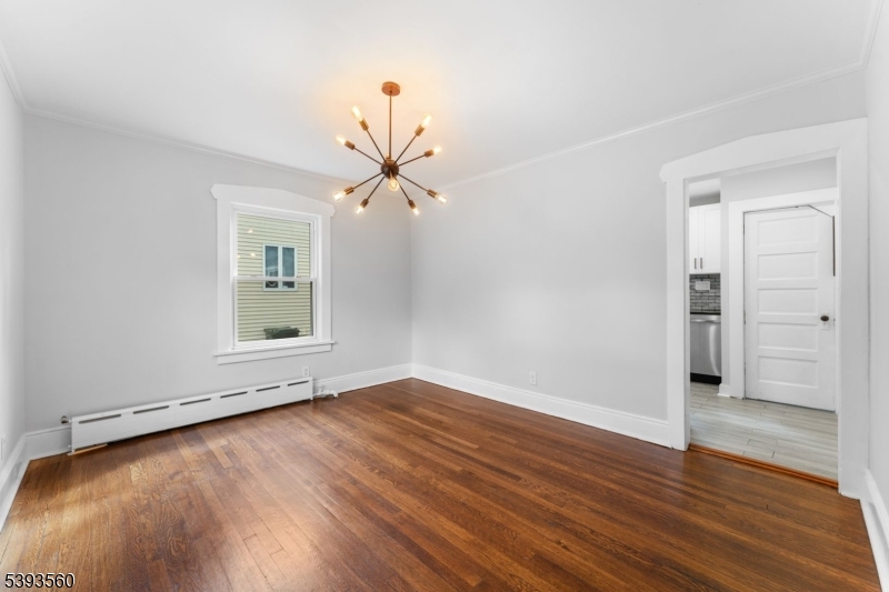 177 West Pierrepont Avenue Rutherford, NJ 07070 - Photo 12 of 27 wooden floor in an empty room with a window