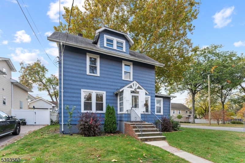 177 West Pierrepont Avenue Rutherford, NJ 07070 - Photo 2 of 27 a front view of a house with a garden