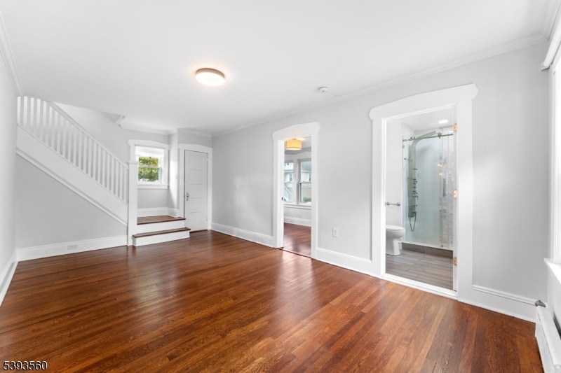 177 West Pierrepont Avenue Rutherford, NJ 07070 - Photo 7 of 27 wooden floor in an empty room with a window