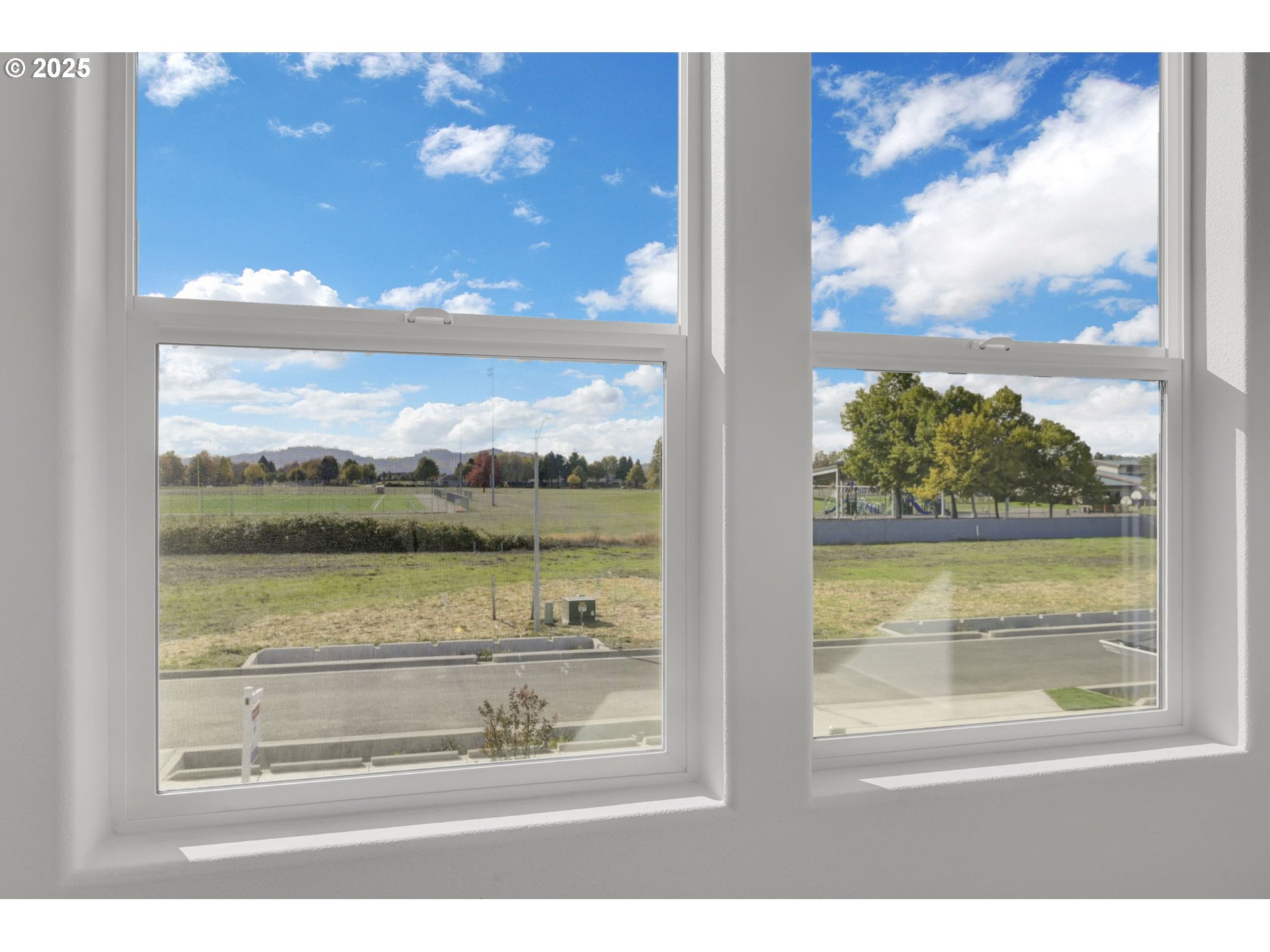 5653 Magnificence Way Eugene, OR 97402 - Photo 25 of 44 a view of a glass door and sky view