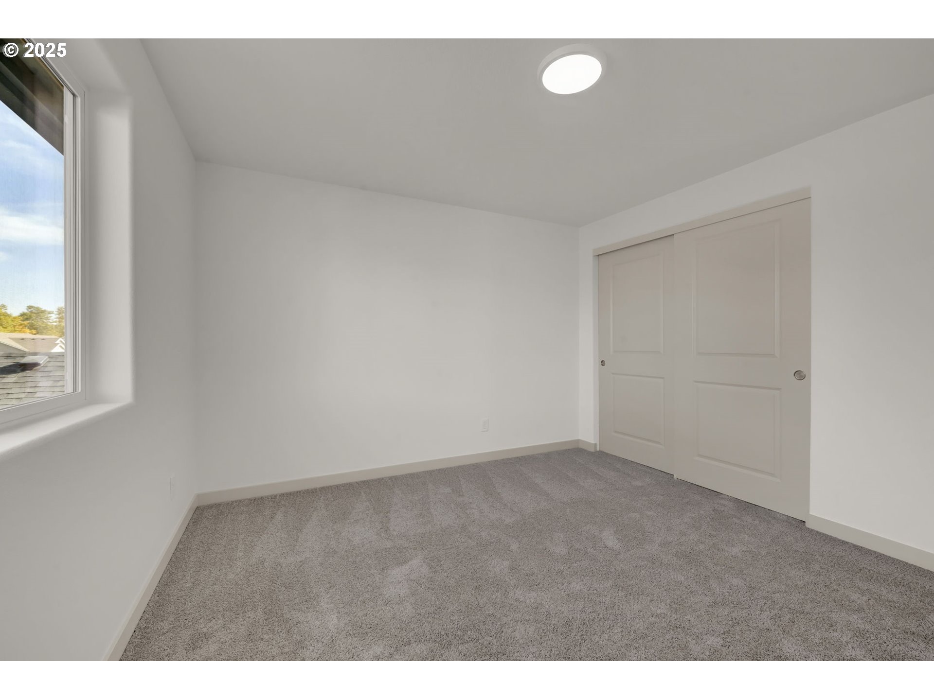 5653 Magnificence Way Eugene, OR 97402 - Photo 36 of 44 a view of an empty room with a window