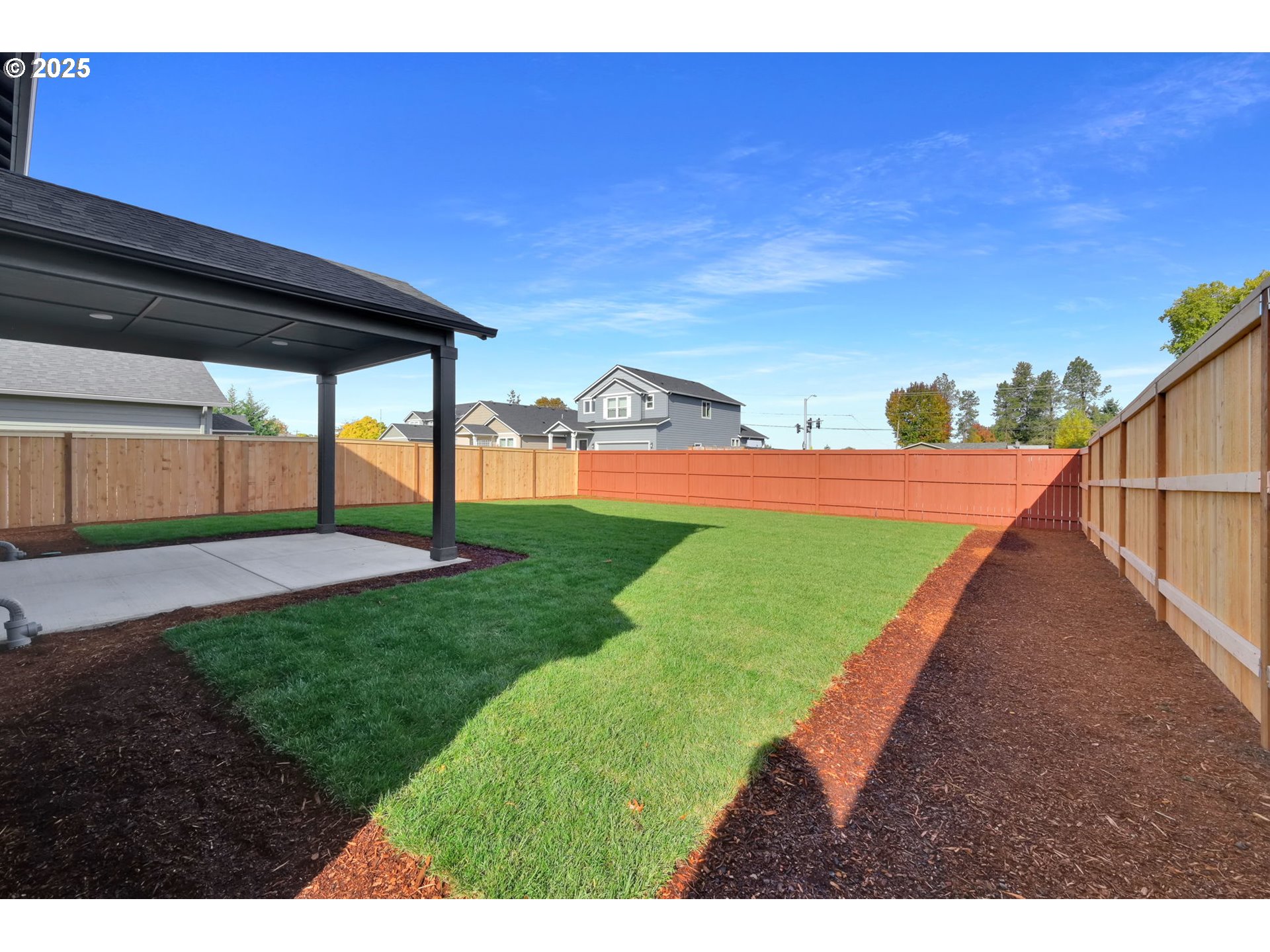 5653 Magnificence Way Eugene, OR 97402 - Photo 40 of 44 a view of a backyard with lawn chairs fire pit