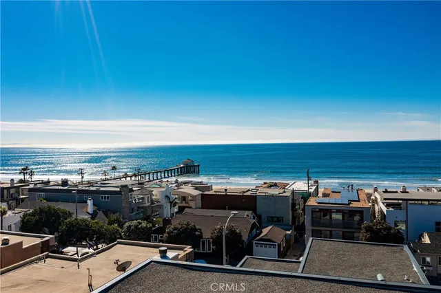 a view of a balcony with an ocean view
