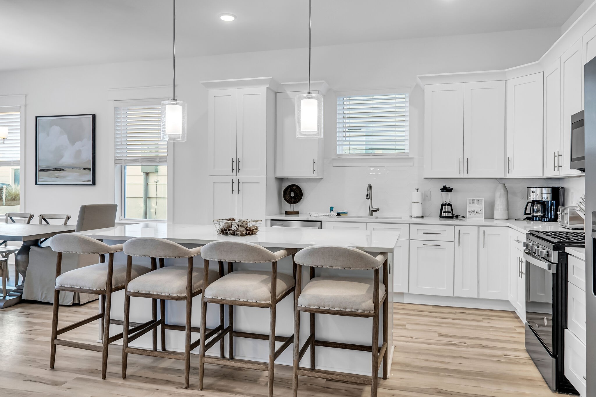 807 Saddle Ridge Drive Old Hickory, TN 37138 - Photo 6 of 24 a kitchen with a dining table chairs and white cabinets
