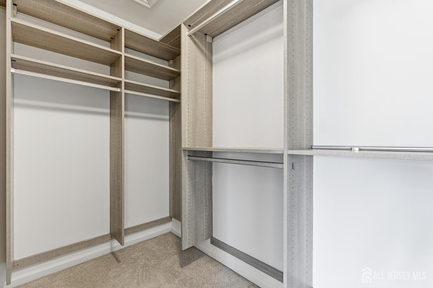 12 Rondell Lane Old Bridge, NJ 08879 - Photo 22 of 34 a view of an empty walk in closet