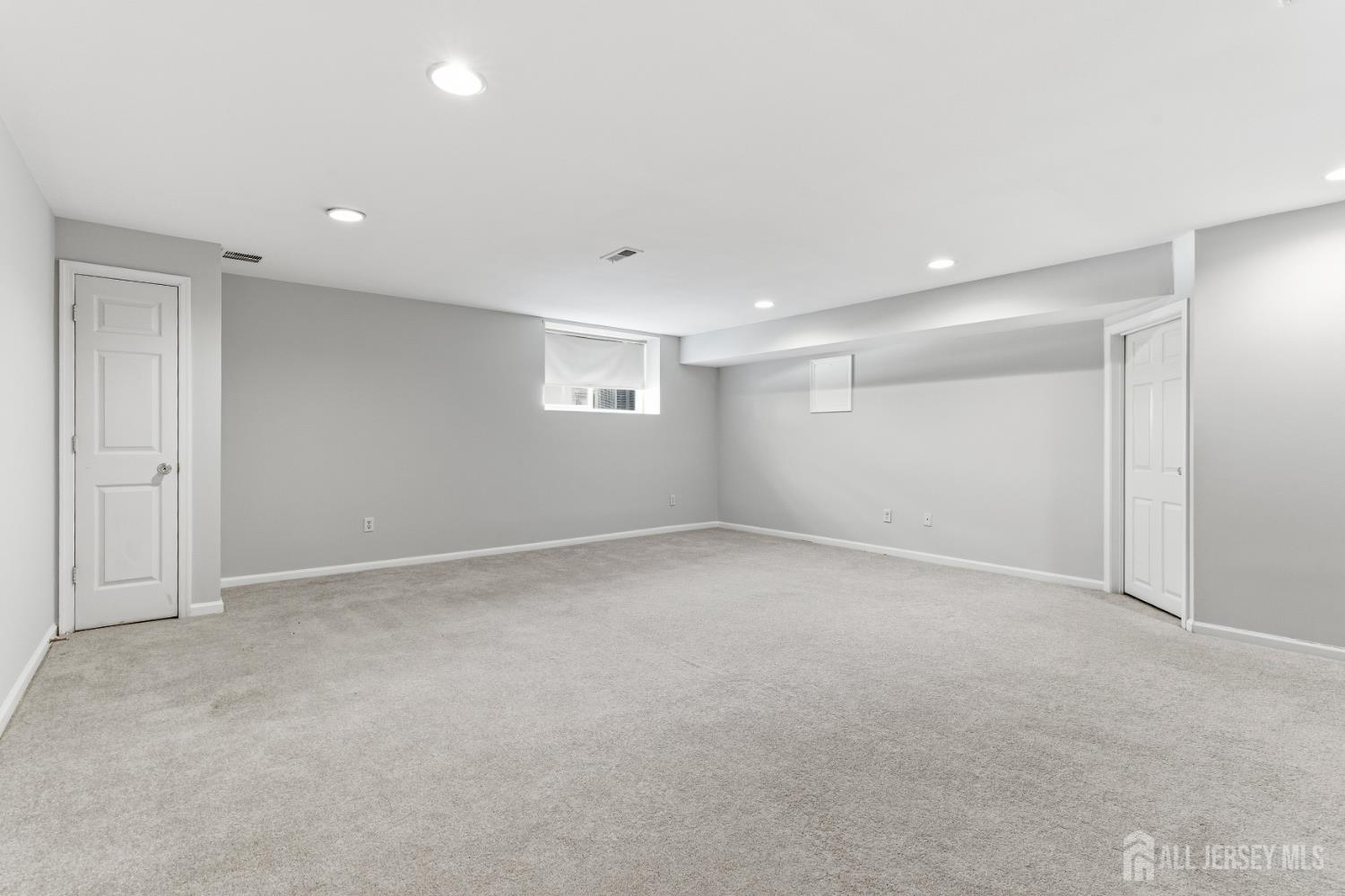 12 Rondell Lane Old Bridge, NJ 08879 - Photo 30 of 34 an empty room with a empty space and windows