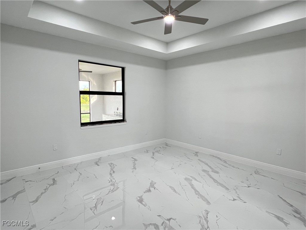 1010 Angelo Avenue Lehigh Acres, FL 33971 - Photo 11 of 34 an empty room with a window