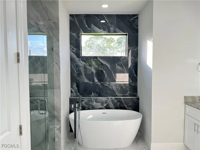 a view of a bathtub in a bathroom