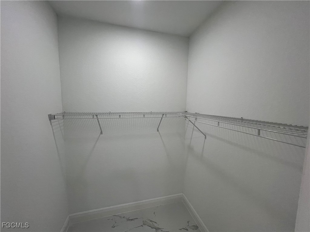 1010 Angelo Avenue Lehigh Acres, FL 33971 - Photo 17 of 34 a view of a room