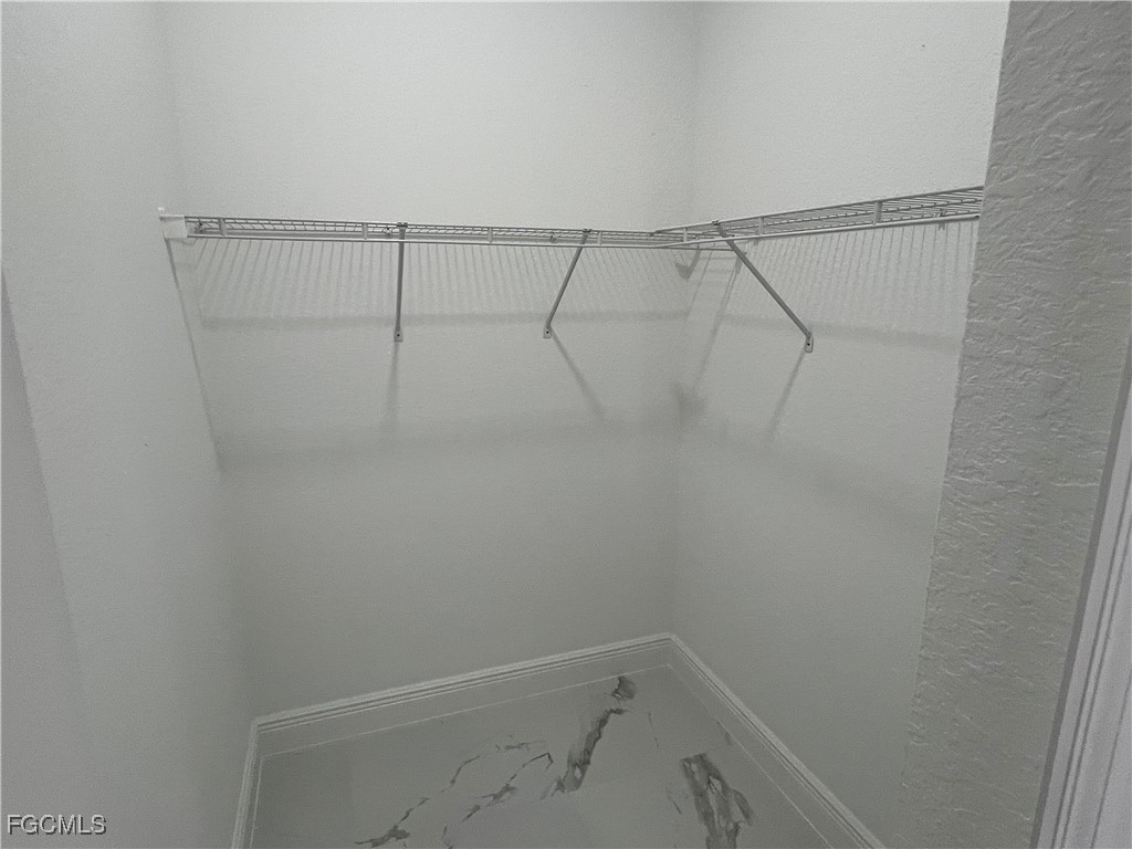 1010 Angelo Avenue Lehigh Acres, FL 33971 - Photo 25 of 34 a view of a small room