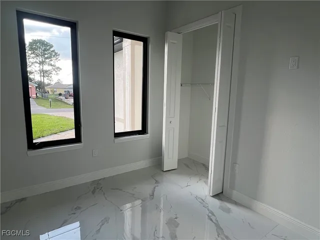 an empty room that has a window